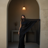 Whisper in Air saree silhouette – sheer black chiffon moving like a second skin