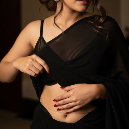 Woman wearing a black dress with a blurred background