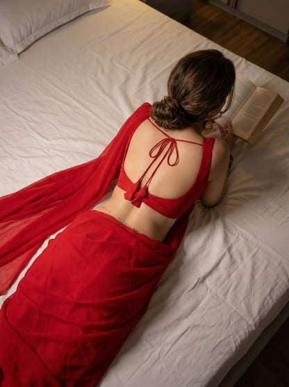 Velvet Temptation After Dark Saree overhead editorial – red chiffon saree flat lay