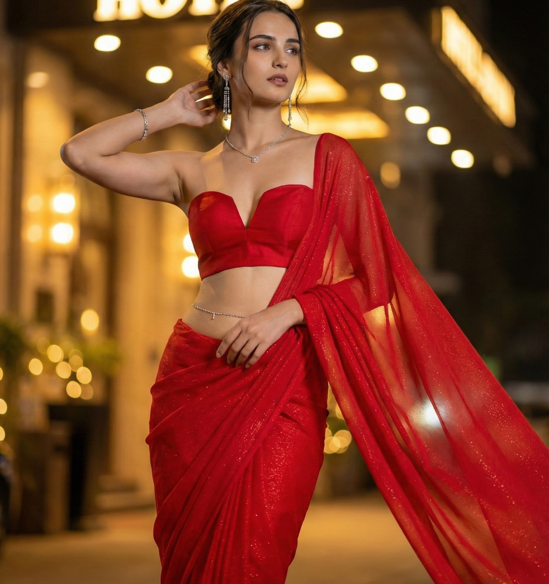 Woman in Starlace Flame saree – deep red star georgette for grand entrances and festive evenings