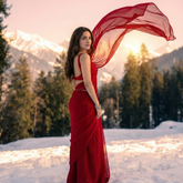 Scarlet Crimson chiffon saree lifestyle – red drape for date nights and intimate celebrations
