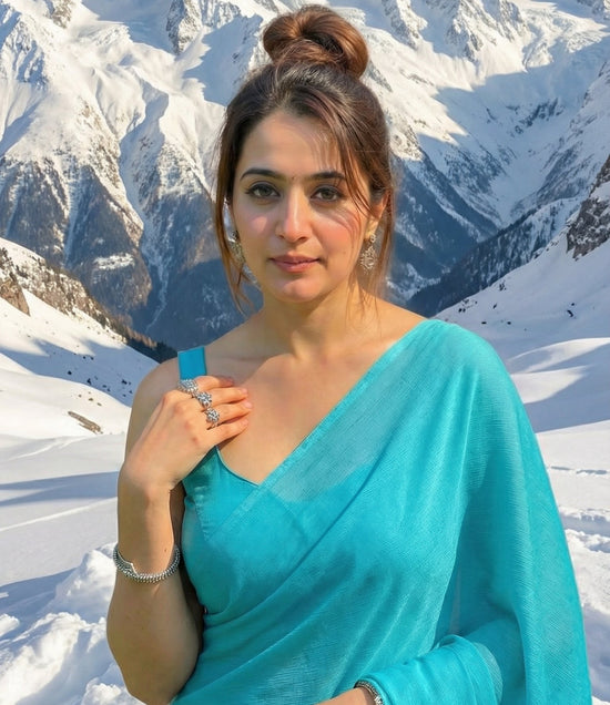 Aqua Desire teal chiffon saree by Authority of Fashion – makes him look twice and look away