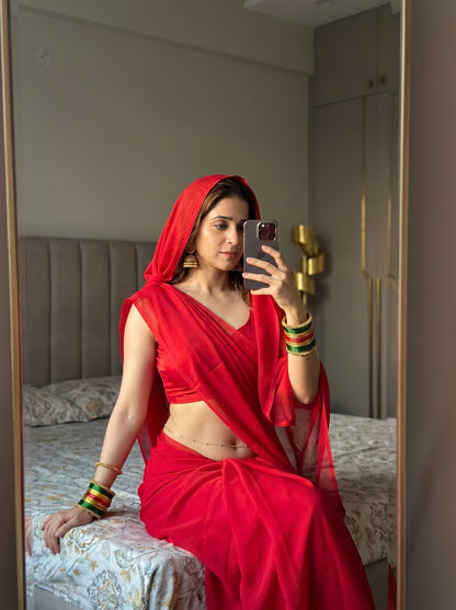 Velvet Temptation chiffon saree editorial – bold red After Dark saree with belly chain